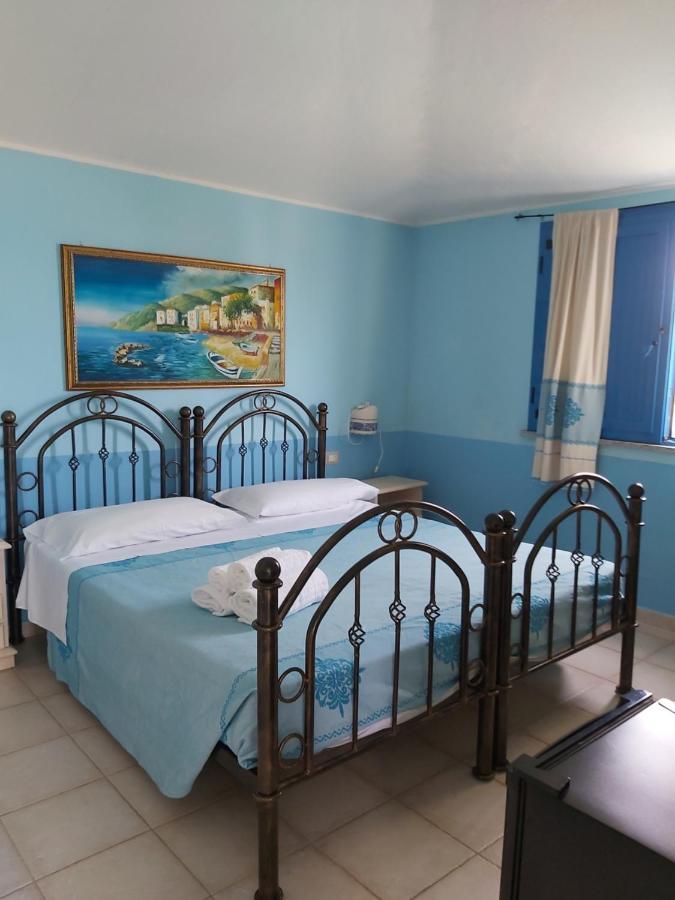 Hotel Baia Cea Bari Sardo Bagian luar foto