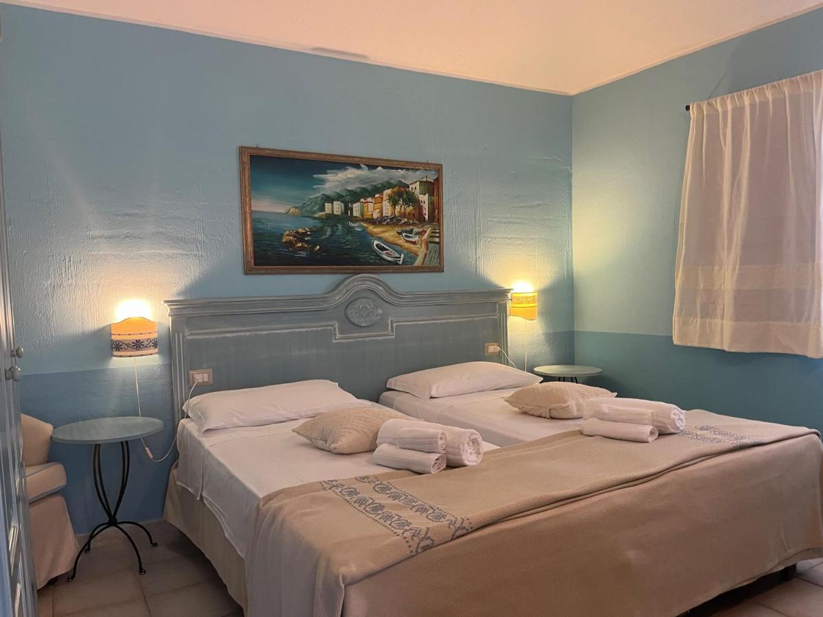 Hotel Baia Cea Bari Sardo Bagian luar foto