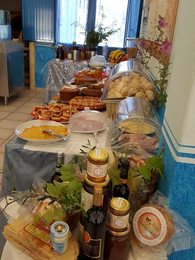 Hotel Baia Cea Bari Sardo Bagian luar foto